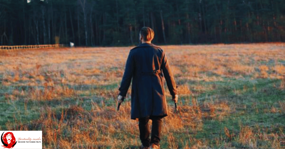 a man holding two pistols
